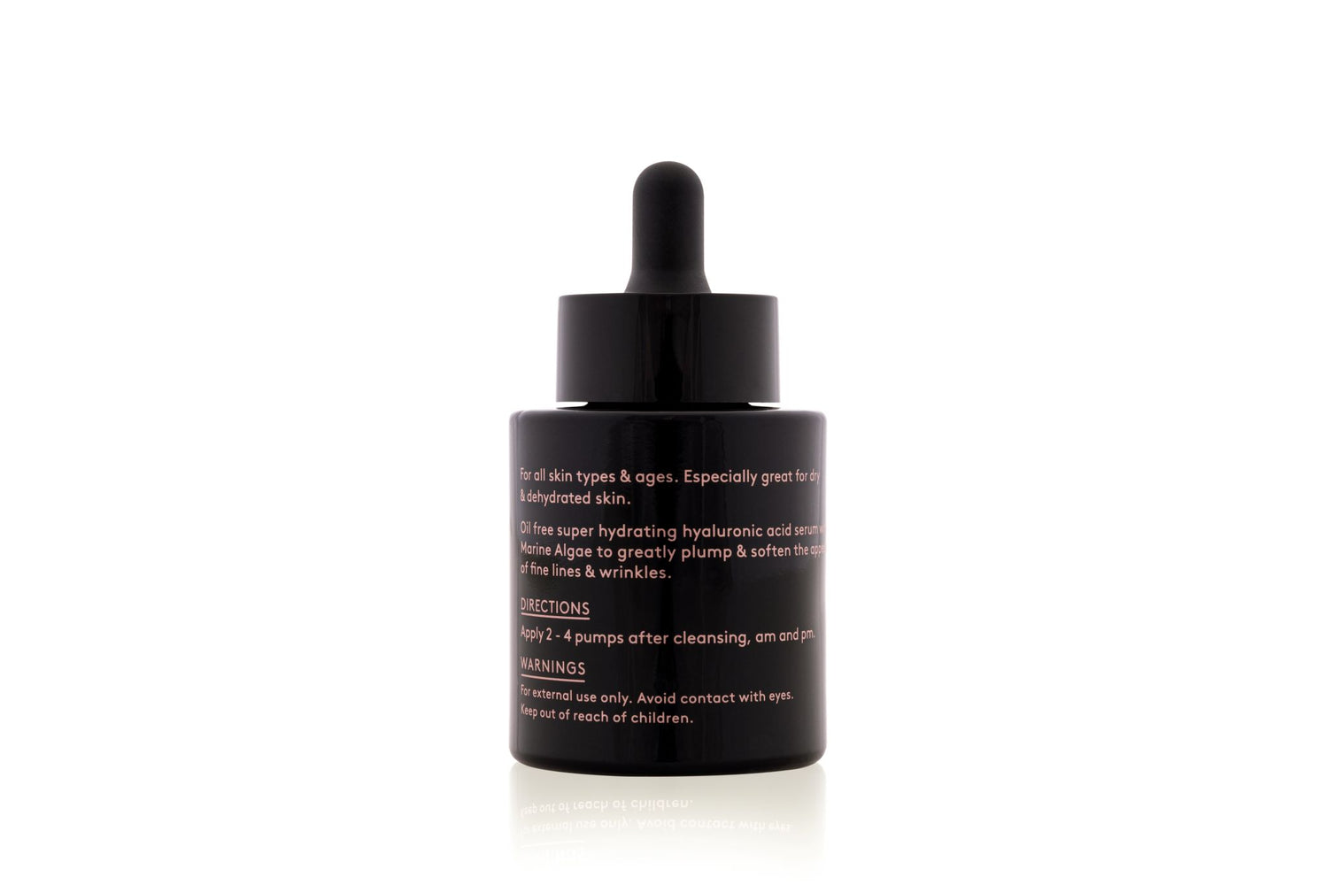 A dark glass dropper bottle containing facial serum.