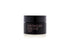 Black jar of Georgia Louise eye balm on a white background.