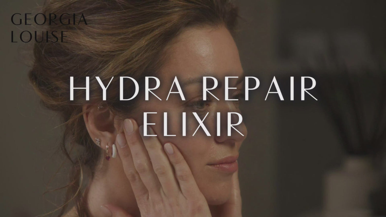 A woman applying a skincare product named &