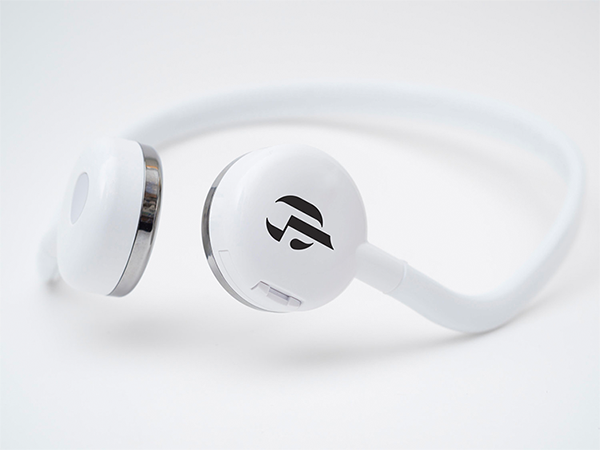 A pair of white over-ear headphones with a logo on the earcup.
